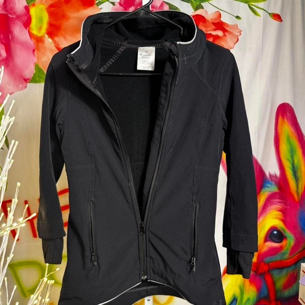 H50. Black Ivivva Athletica jacket with hood and pockets. Size: 6